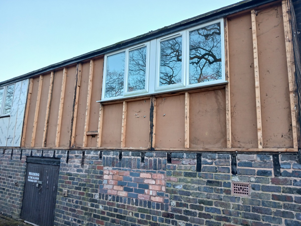 Cladding removed ready to insulate and fit new boards